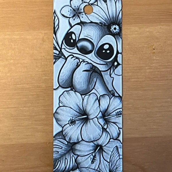 Çizgi Karakter ve Çiçek Desenli Kitap Ayracı – Sevimli Sanatsal Tasarım Çizgi Karakter ve Çiçek Desenli Kitap Ayracı – Sevimli Sanatsal Tasarım